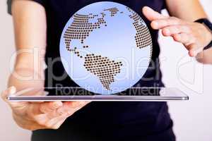 Woman holding tablet PC with globe