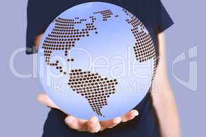 Woman holding world globe