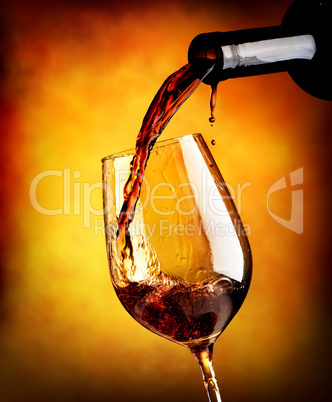 Red wine on orange background