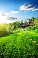 Wooden houses on meadow