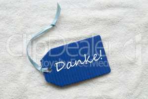 Danke Means Thank You On Blue Label Sand Background