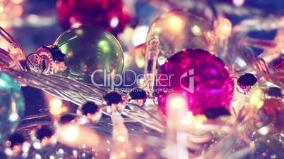 blinking lightbulbs and christmas balls close-up panning