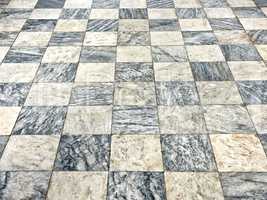 old floor of light and dark marble squares