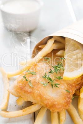 Fish and chips in paper cone