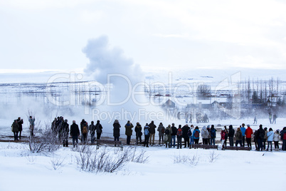 Visitors at the geyser erruption of Strokkur, Iceland