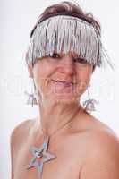 Woman adorned with tinsel for Christmas