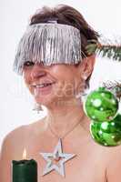 Woman adorned with tinsel for Christmas
