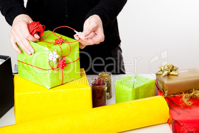 Woman bagging Christmas gifts