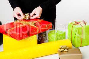 Woman bagging Christmas gifts