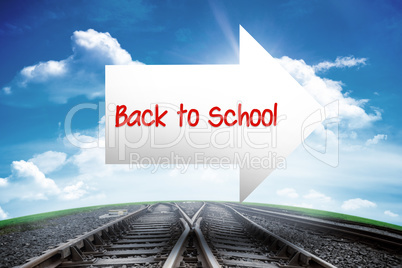 Back to school against railway leading to blue sky