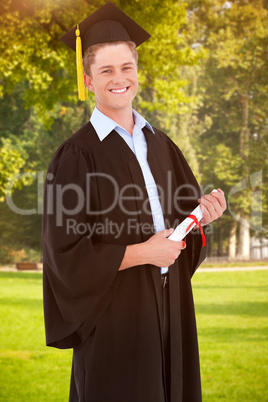 Composite image of a smiling man looking at the camera as he gra