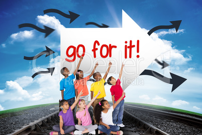Go for it! against railway leading to blue sky