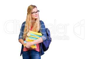 Composite image of pretty student in the library