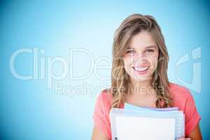 Composite image of smiling hipster holding notebook