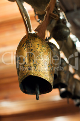 Old rural village bell. Old brass village bell for cows. Picture is proper for rural design.