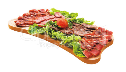 Cold cuts on wood plateau isolated on white. Gourmet food.