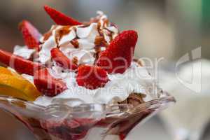 Delicious vanilla sundae with strawberry