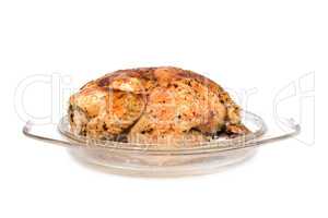Roast chicken in glass plate isolated on white