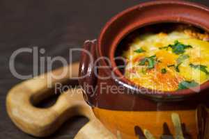 Stew pot with sausage and cheese