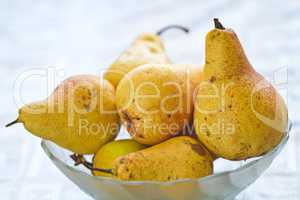 Fresh pears in cup