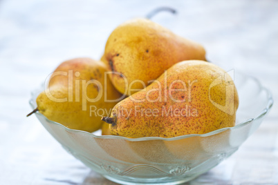 Fresh pears in cup