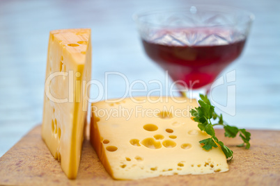 Emental cheese and wine shoot with short DOF