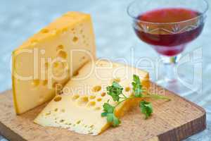 Emental cheese and wine shoot with short DOF