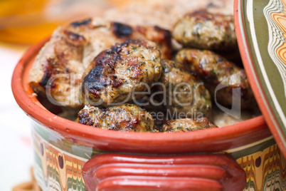 Meatballs in clay bowl, traditional cuisene