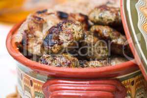 Meatballs in clay bowl, traditional cuisene