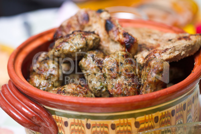 Meatballs in clay bowl, traditional cuisene