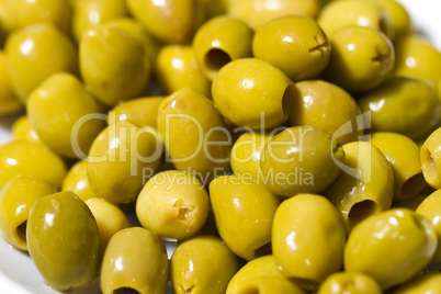 Fresh raw olives with shiny oil