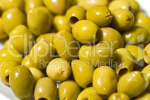 Fresh raw olives with shiny oil