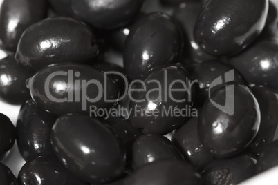 Fresh raw olives with shiny oil