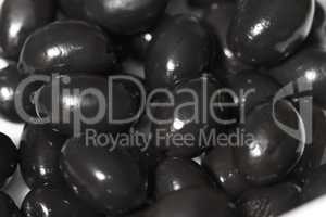Fresh raw olives with shiny oil
