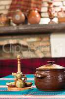 Old village tavern. Rural interior of table with cup of gourmet meal and blur background.