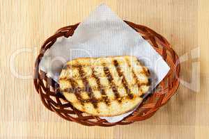 Baked bread in plate. Proper for restaurant menu.