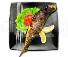 Baked trout fish in isolated on white.