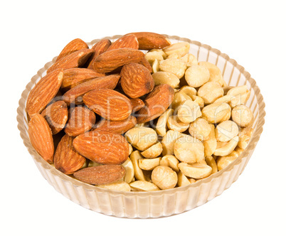 Peanut and almod nuts isolated on white