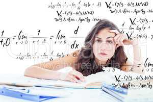 Composite image of bored student doing her homework