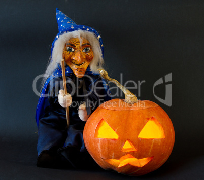 Helloween pumpkin with scary riding hag