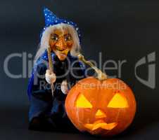 Helloween pumpkin with scary riding hag