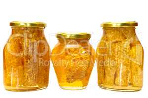 Honey jars isolated on white