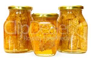Honey jars isolated on white