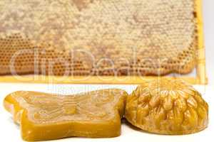 Wax and honeycomb isolated on white