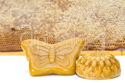 Wax and honeycomb isolated on white