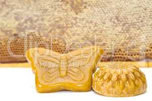 Wax and honeycomb isolated on white