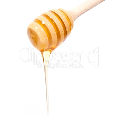 Stick with honey isolated on white