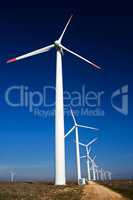 Wind power generators on blue sky