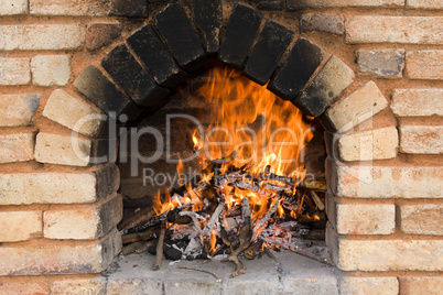 Fireplace with fire and embers