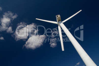 Wind power generators on blue sky